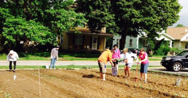 Church volunteers planting a community garden in the neighborhood